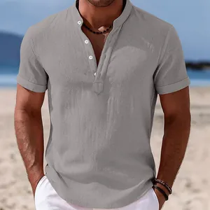 Close-up of grey men's short-sleeved linen shirt with stand collar and button detail
