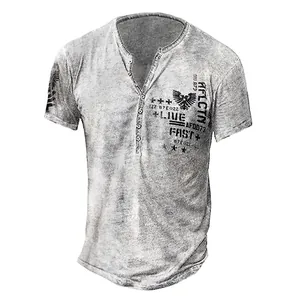 Detail showing grey distressed fabric and vintage graphic print on a Henley t-shirt.