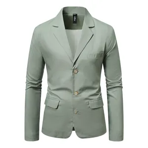 Close-up of sage green men's cotton linen casual blazer with three buttons
