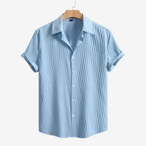 Detailed view of light blue textured short sleeve shirt for men with lapel collar
