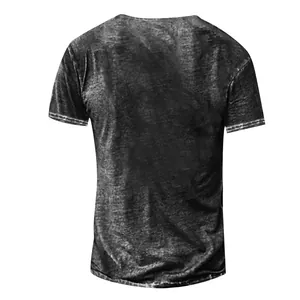 Detailed back view of a black men's short-sleeve T-shirt with vintage washed texture