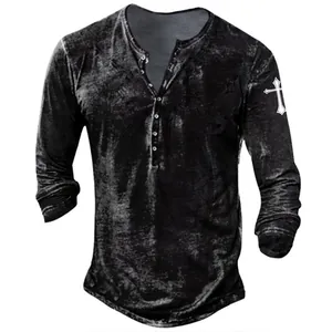 Detail showing the white cross print and acid wash texture on a black henley t-shirt.