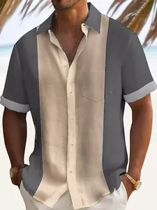 Detail of men's casual short-sleeve shirt with stylish grey and beige color-block design