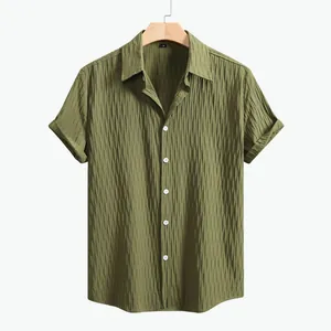 Detailed view of men's olive green textured seersucker short-sleeved casual shirt