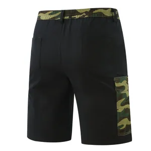 Back view of men's black cargo shorts with camouflage waistband and side pocket detail