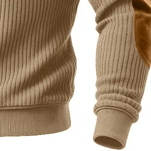 Detailed macro view of men's ribbed knit sweatshirt with textured suede elbow patch
