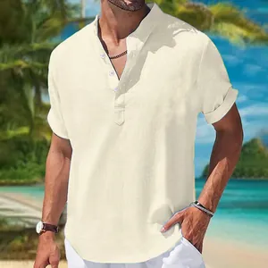 Detail view of a men's loose fit cream cotton linen shirt with stand collar and half placket