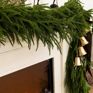 Realistic soft touch Norfolk Pine Christmas garland with golden bells for mantel decoration