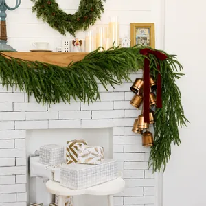 Lifelike Norfolk pine Christmas garland perfect for mantle and fireplace decoration