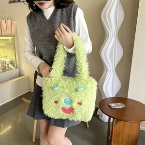 Detailed view of a cute lime green plush monster handbag featuring a cartoon face
