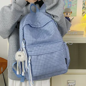 Blue Korean style checkered backpack for students with a large capacity and cute charm