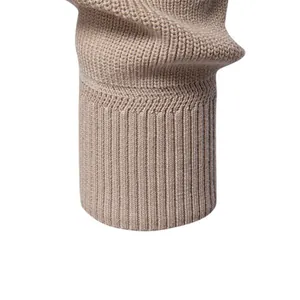 Detailed view of the ribbed sleeve cuff on a beige men's casual knitted sweater