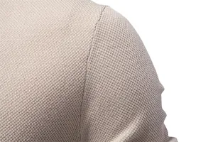 Macro detail of high-quality breathable pique fabric and fine stitching on men's t-shirt