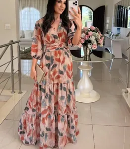 Elegant V-neck maxi dress with vintage leaf print and tiered ruffled skirt