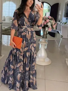 Elegant V-neck printed long dress with leaf patterns for stylish summer fashion