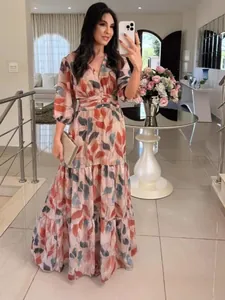 Elegant V-neck floral print maxi dress for women featuring a stylish tiered skirt design