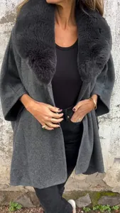 Elegant women's dark grey winter cape coat with luxurious oversized faux fur collar