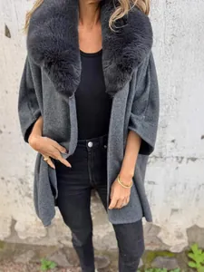 Women's elegant autumn winter loose cape coat featuring a luxurious large faux fur collar in gray