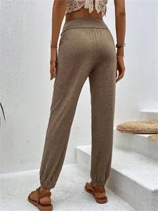 Detailed rear view of brown high-waisted jogger pants for women, soft casual loungewear style