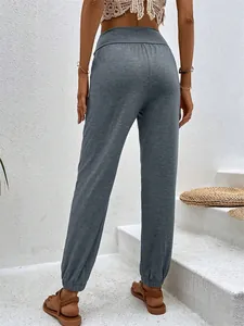 Back view of women's casual grey high-waisted loungewear joggers with elastic cuffs