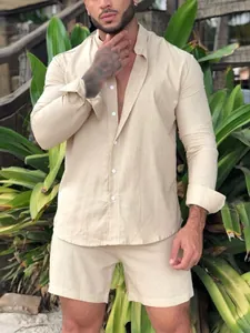 Detail view of men's beige cotton linen long sleeve shirt and matching shorts set.