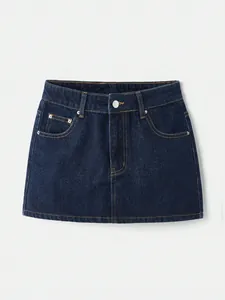 Detailed view of a stylish dark blue high-waisted denim mini skirt with classic pockets.