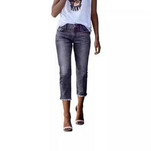 Stylish vintage slim stretch cropped jeans for women featuring trendy frayed hem details