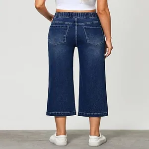 Back view of high-waisted blue elastic waist straight-leg cropped denim culottes