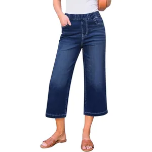 Dark blue straight-leg cropped denim jeans with comfort elastic waistband shown on model