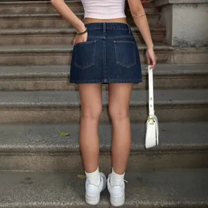 Stylish high-waisted dark blue denim mini skirt with functional back pockets for women