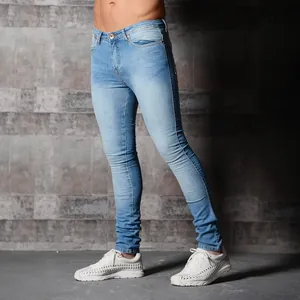 Men's light blue skinny denim jeans featuring a washed finish and classic five-pocket styling