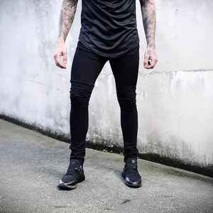 Classic black men's skinny denim jeans with slim fit street style look