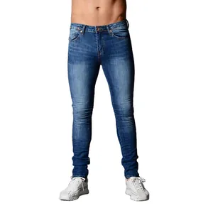 Professional shot of slim fit men's blue denim jeans with washed effect and skinny leg cut