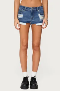 Pantaloncini di denim a vita bassa strappati con orlo a vivo da donna blu