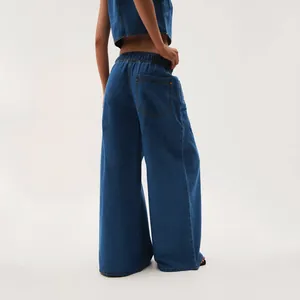 Back view of women's retro low-waist wide-leg denim jeans in dark wash