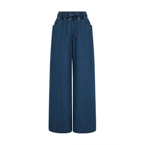 Full view of dark blue vintage wash wide-leg denim pants with elastic drawstring waist