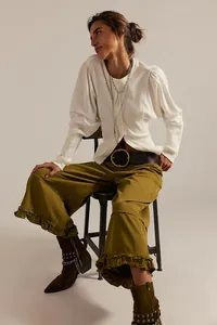 Stylish olive green wide-leg cropped jeans featuring a unique ruffled hem and loose fit