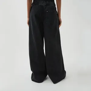 Back view of women's vintage washed grey wide-leg denim jeans with back pocket detail