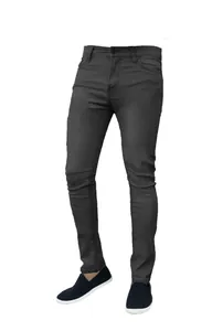 Detailed view of men's charcoal grey stretch slim-fit straight leg denim jeans in white background