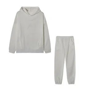 Set due pezzi felpa con cappuccio e pantaloni bianchi da donna in stile sportivo minimalista