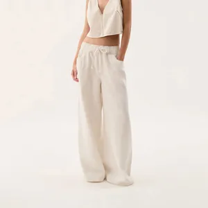 Full view detail of vintage washed wide-leg denim pants and cropped vest outfit set