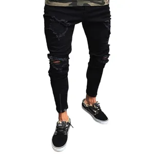 Men's black ripped skinny jeans with stylish ankle zippers for a street-wear look