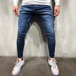 High-quality men's blue stretch skinny denim jeans with classic faded wash finish for a slim fit