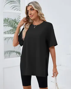 Side view of a loose black T-shirt with side slits and a comfortable round neck