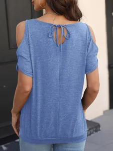 Back view of a blue cold-shoulder t-shirt with tie-back detail and loose fit.
