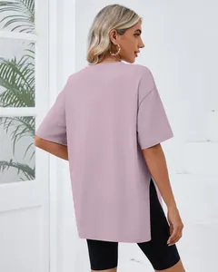 Detailed back view of a mauve oversized short sleeve t-shirt featuring side slits and loose fit