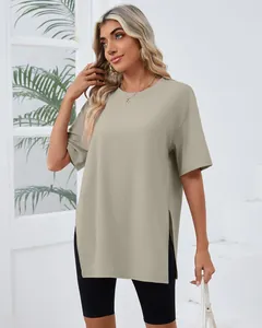 Detail shot of a women's oversized sage green crew neck T-shirt with high side slits