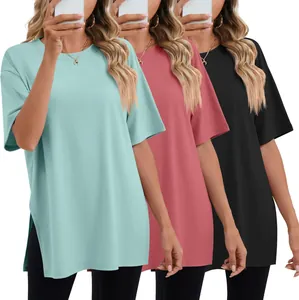 Detail view of the side slit on this loose-fit solid color crew neck T-shirt