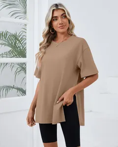Detailed view of women's loose khaki T-shirt featuring stylish side slits and round neck.
