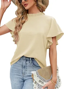 Detail of an elegant women's yellow mock neck blouse with ruffled short sleeves